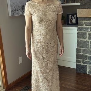 One of a kind formal gown imported from Spain. Ivory peach colour.